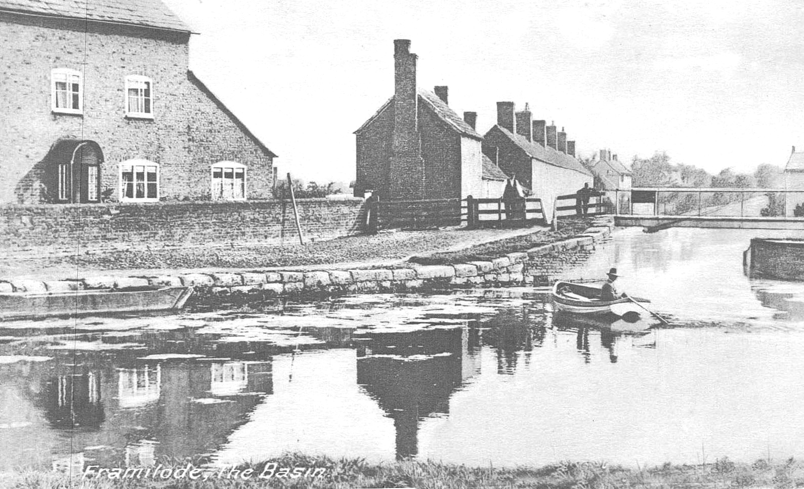 Framilode lock house (left) and the Long Row houses beyond the bridge. (Michael Handford)