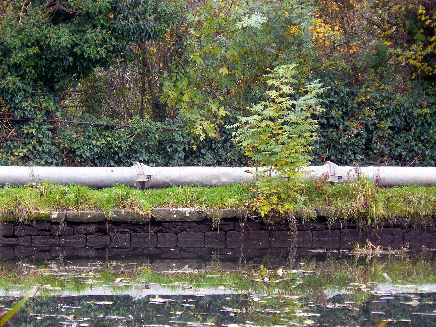 Stone wall supporting towpath
